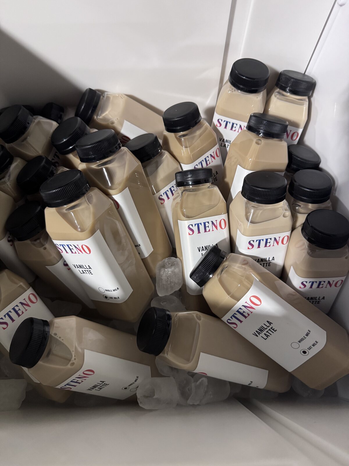 Custom branded bottled lattes prepared for an event