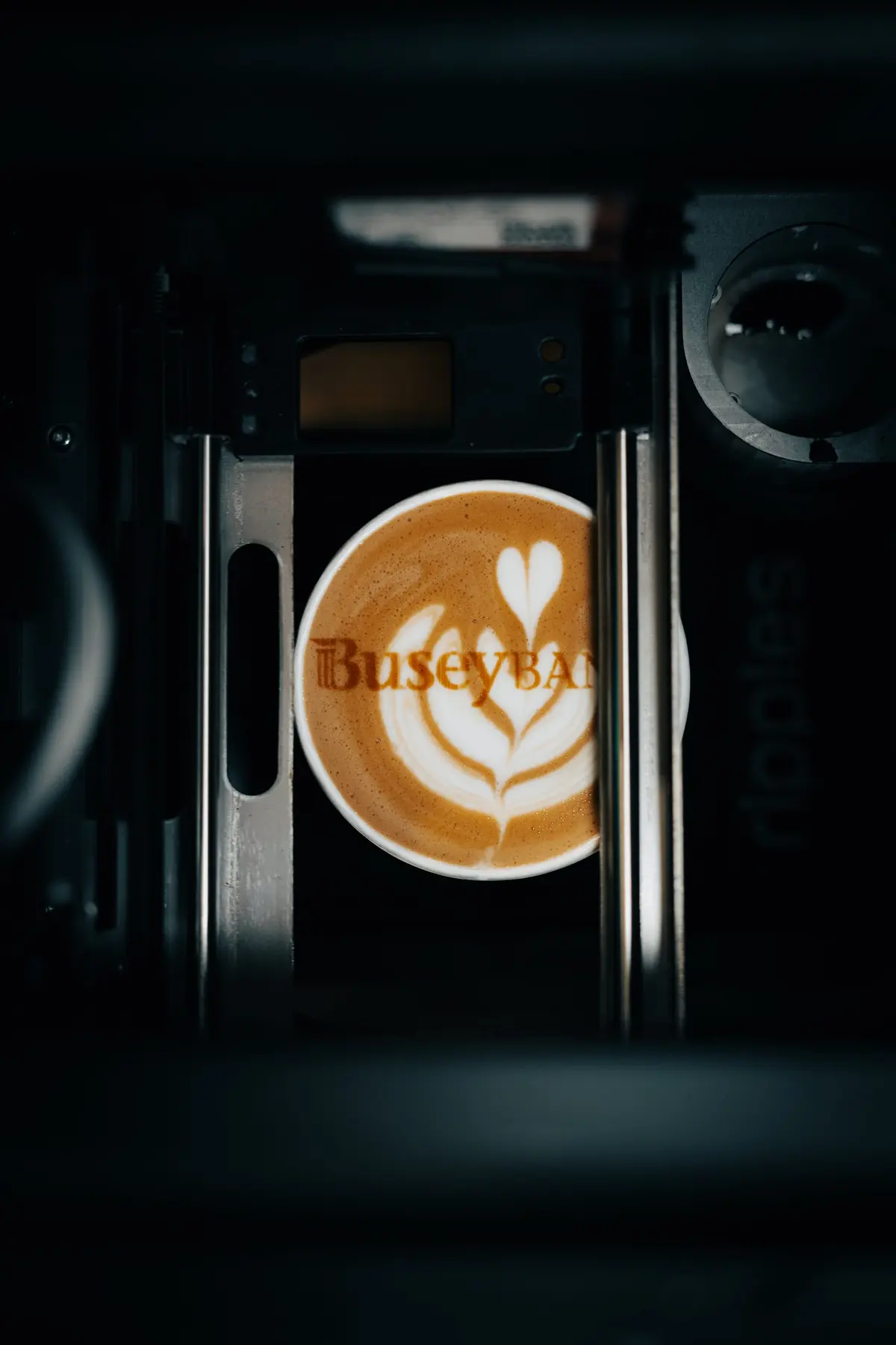 Busey Bank logo printed on latte art at a Leawood, Kansas brand activation