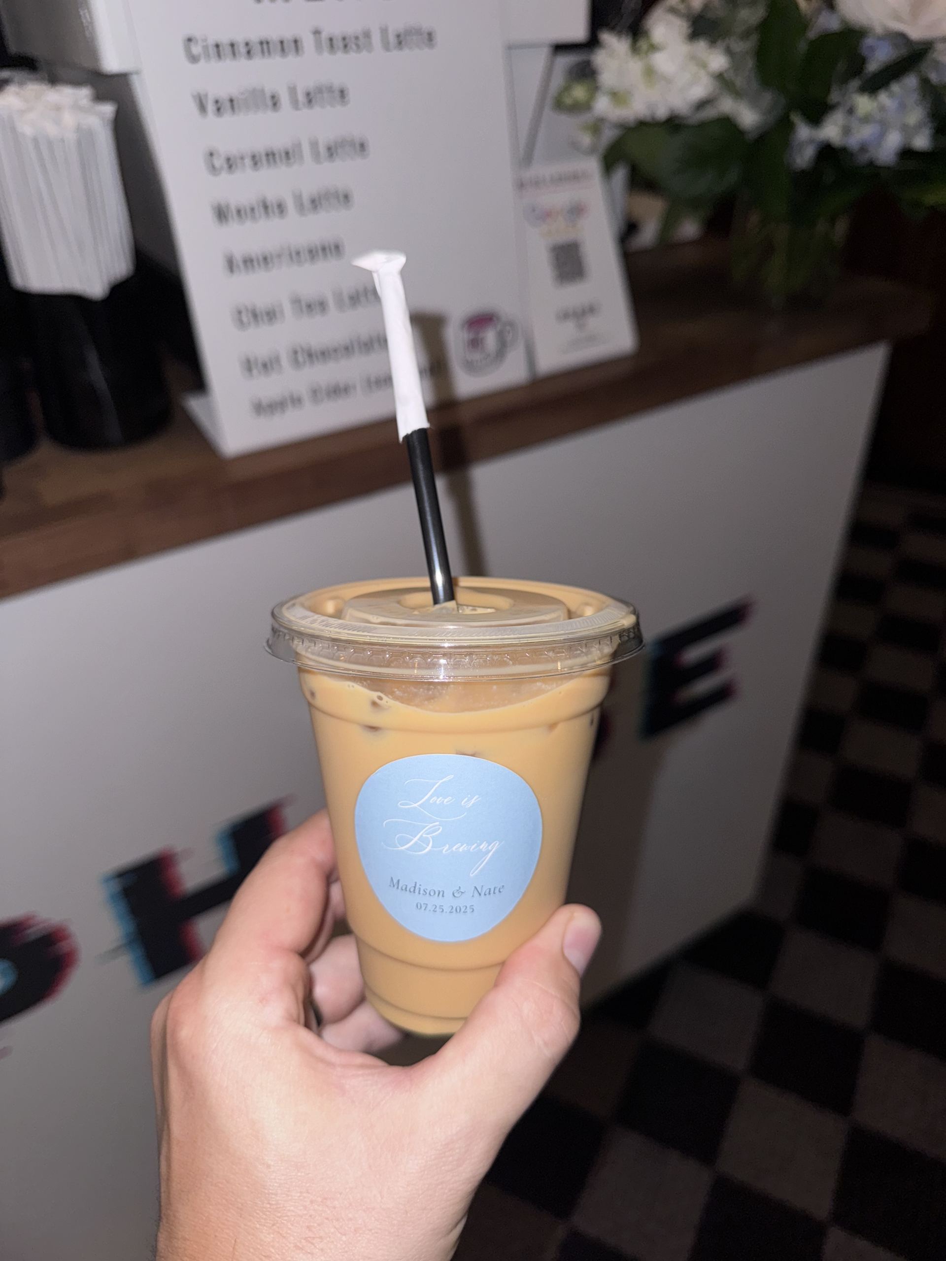 Custom wedding menu sign and branded cup at Phase 2 Coffee Co. Kansas City wedding