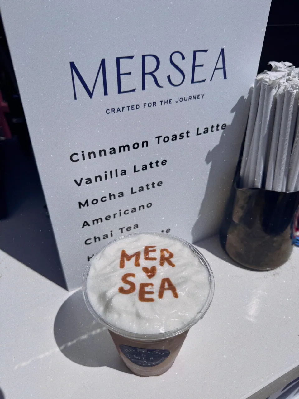 Mersea branded latte art and custom drink menu at the Country Club Plaza