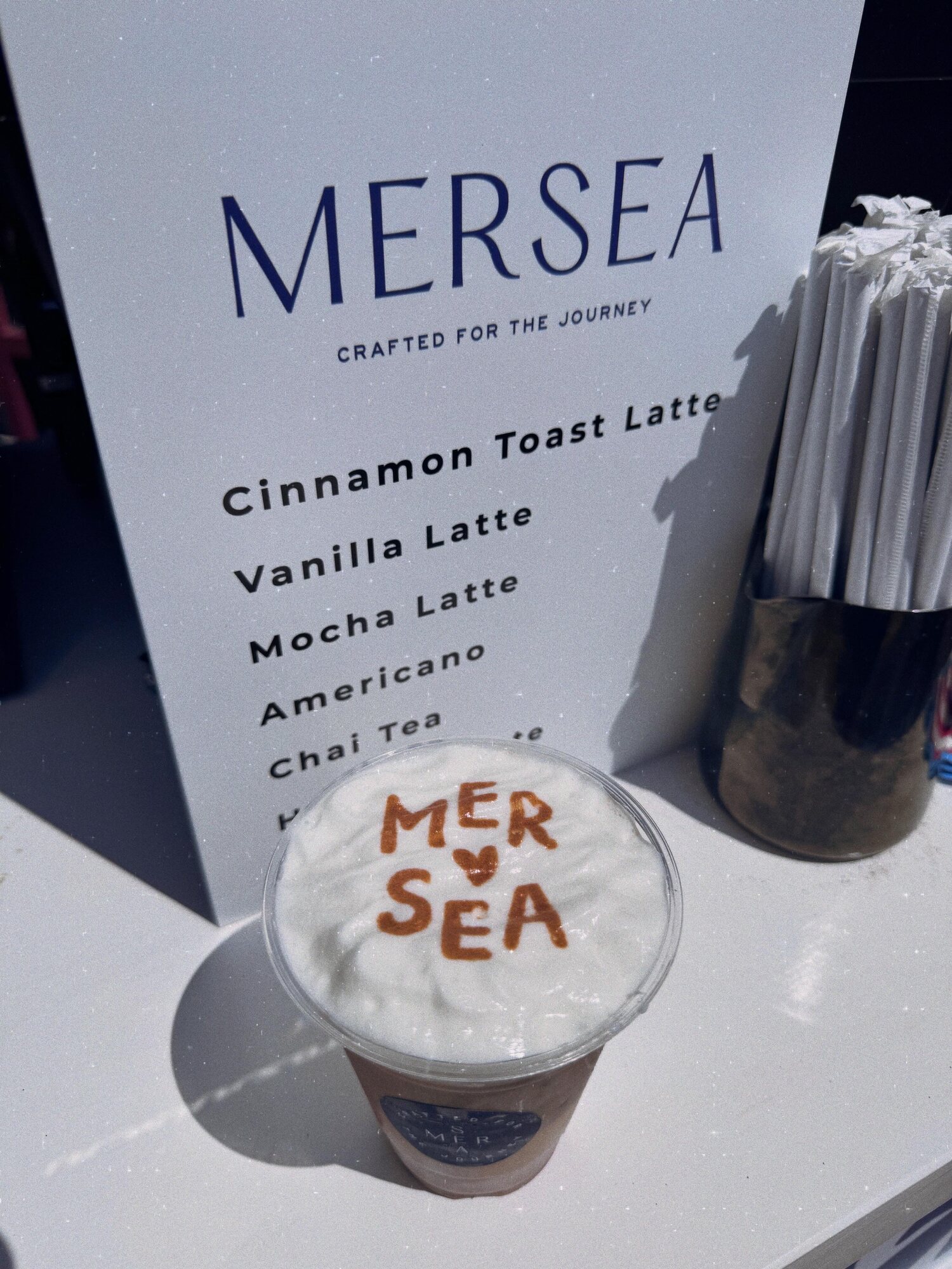 Mersea branded latte art and custom drink menu at the Country Club Plaza
