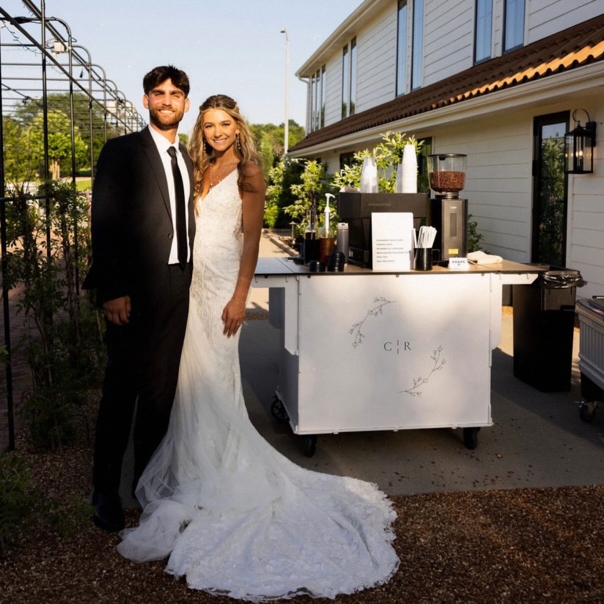 Rylee and Cade with the Phase 2 Coffee Co. cart at The Glass House wedding venue