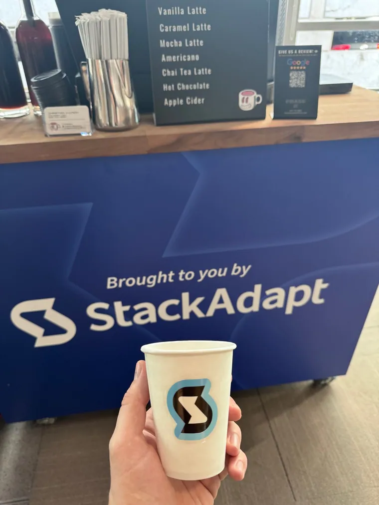 StackAdapt branded coffee cup at Phase 2 Coffee Co. Kansas City activation
