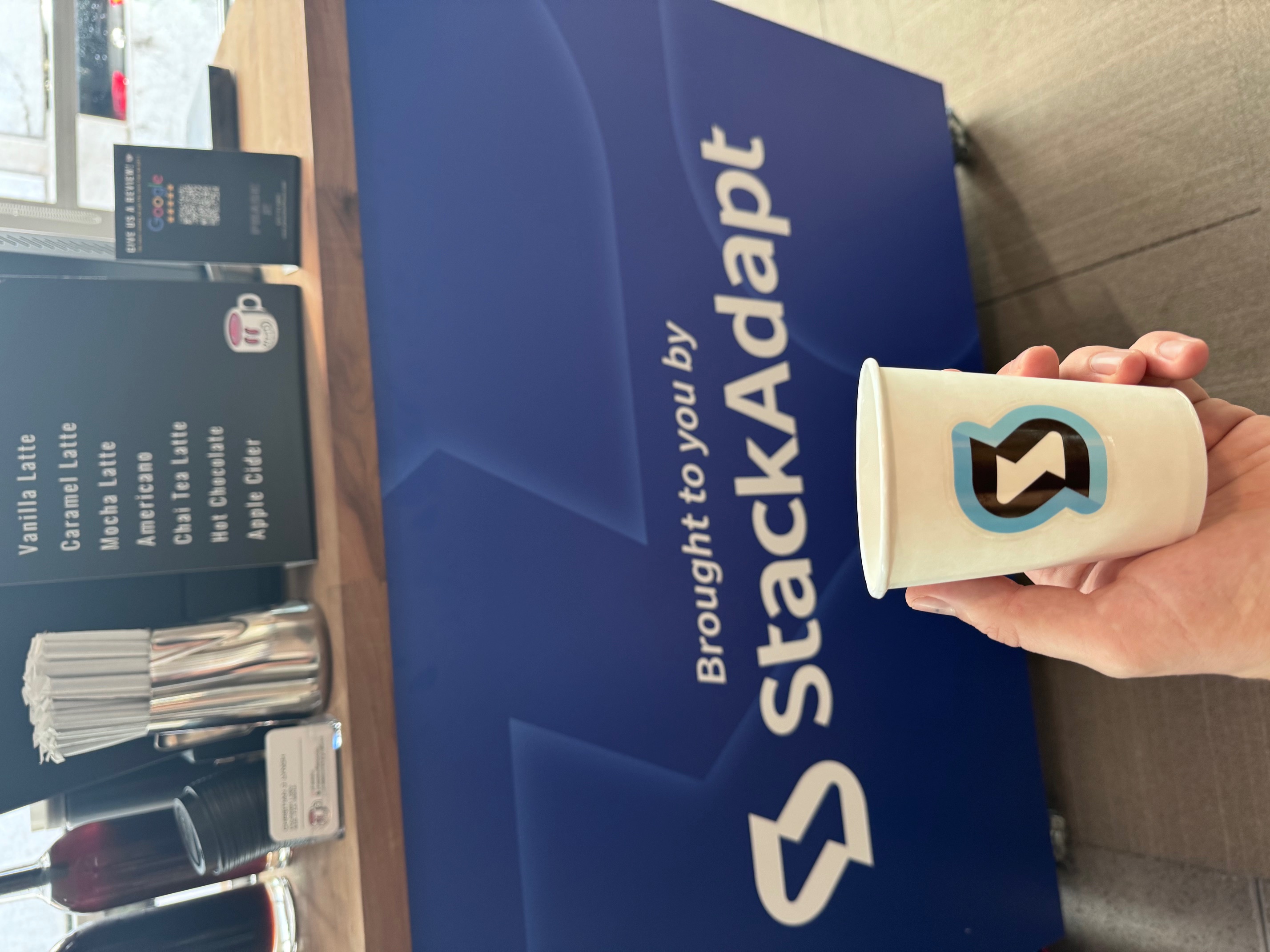 StackAdapt branded coffee cup at Phase 2 Coffee Co. activation