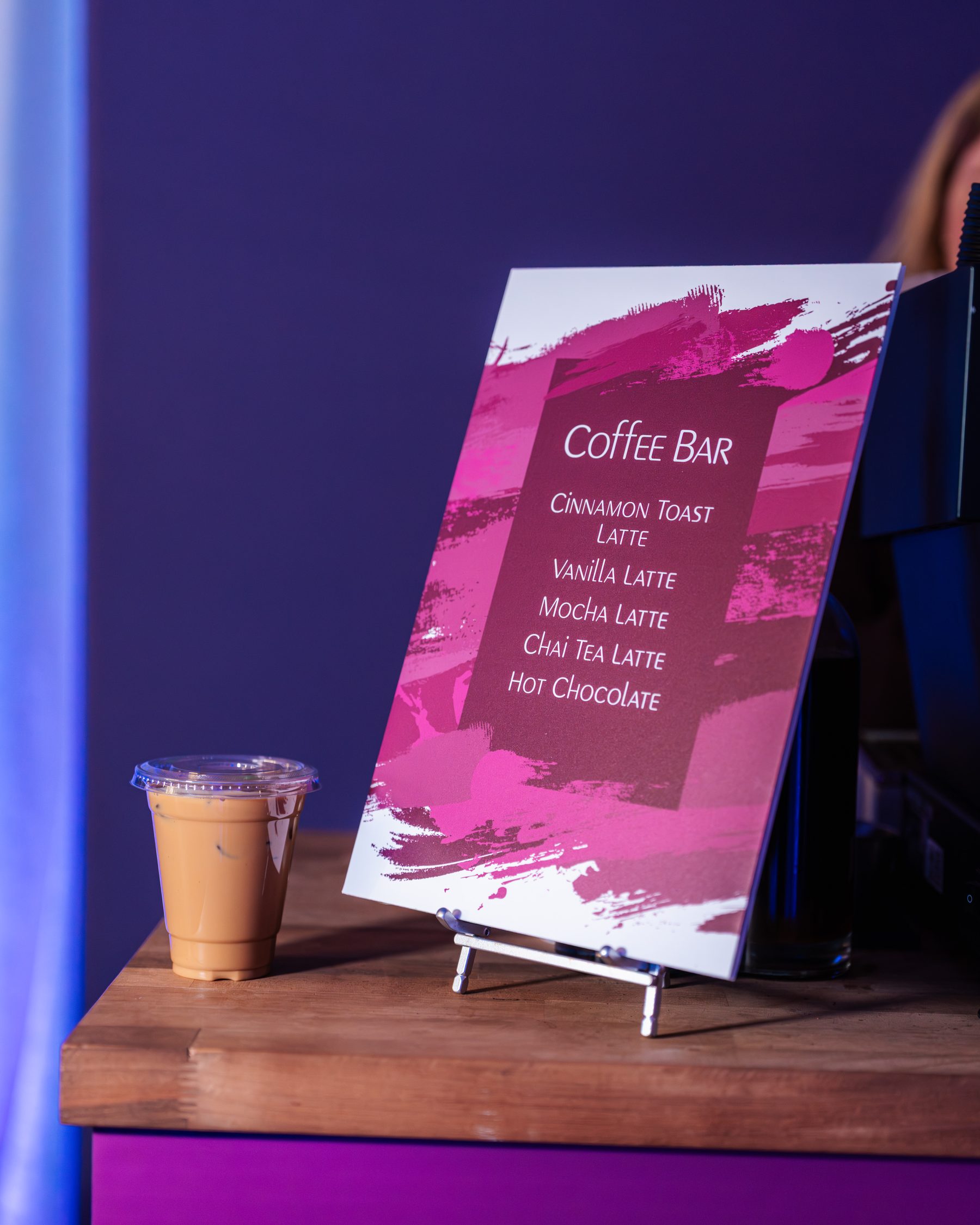Phase 2 Coffee Co. barista serving at Steno brand activation Kansas City