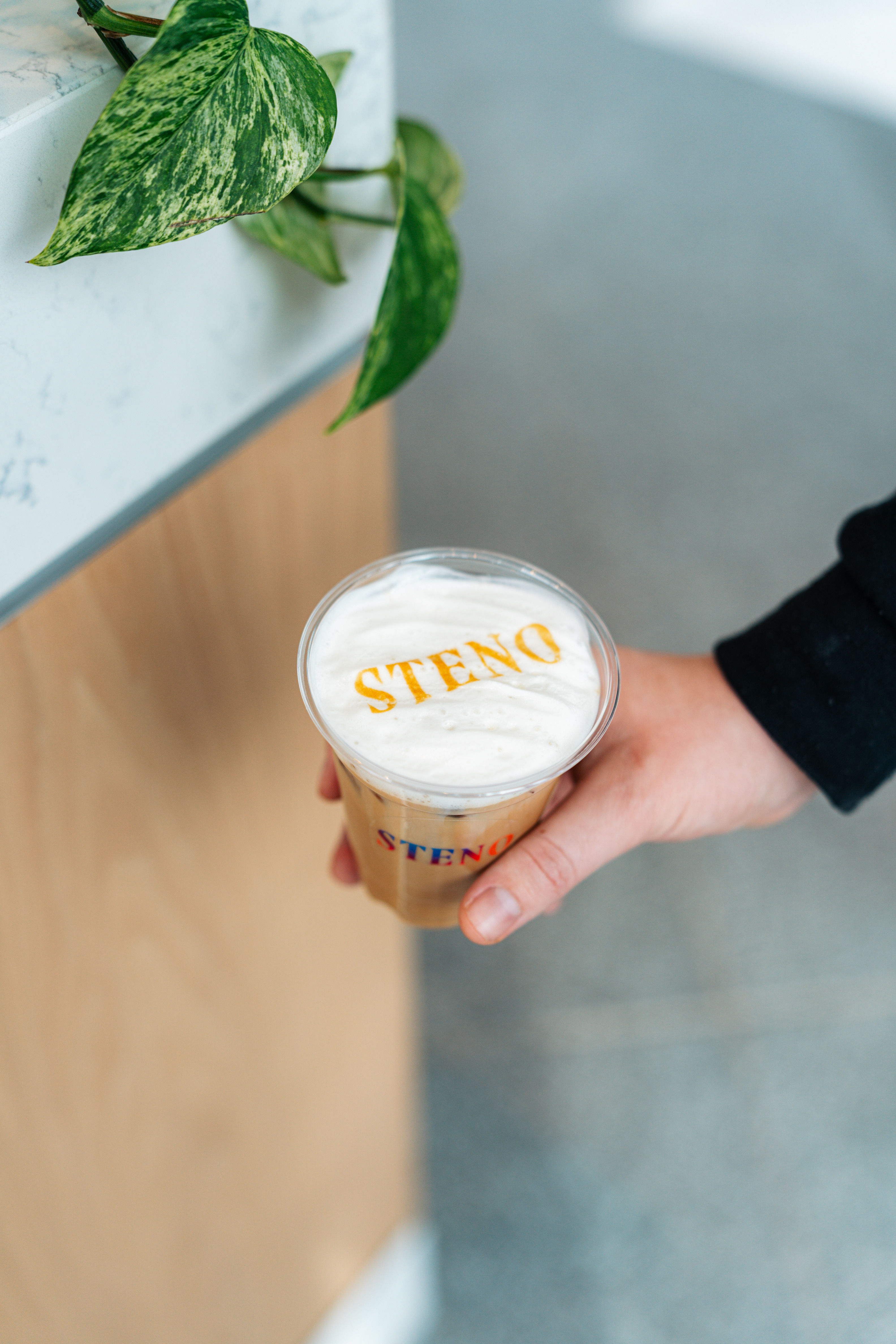 Steno branded cold foam latte by Phase 2 Coffee Co.