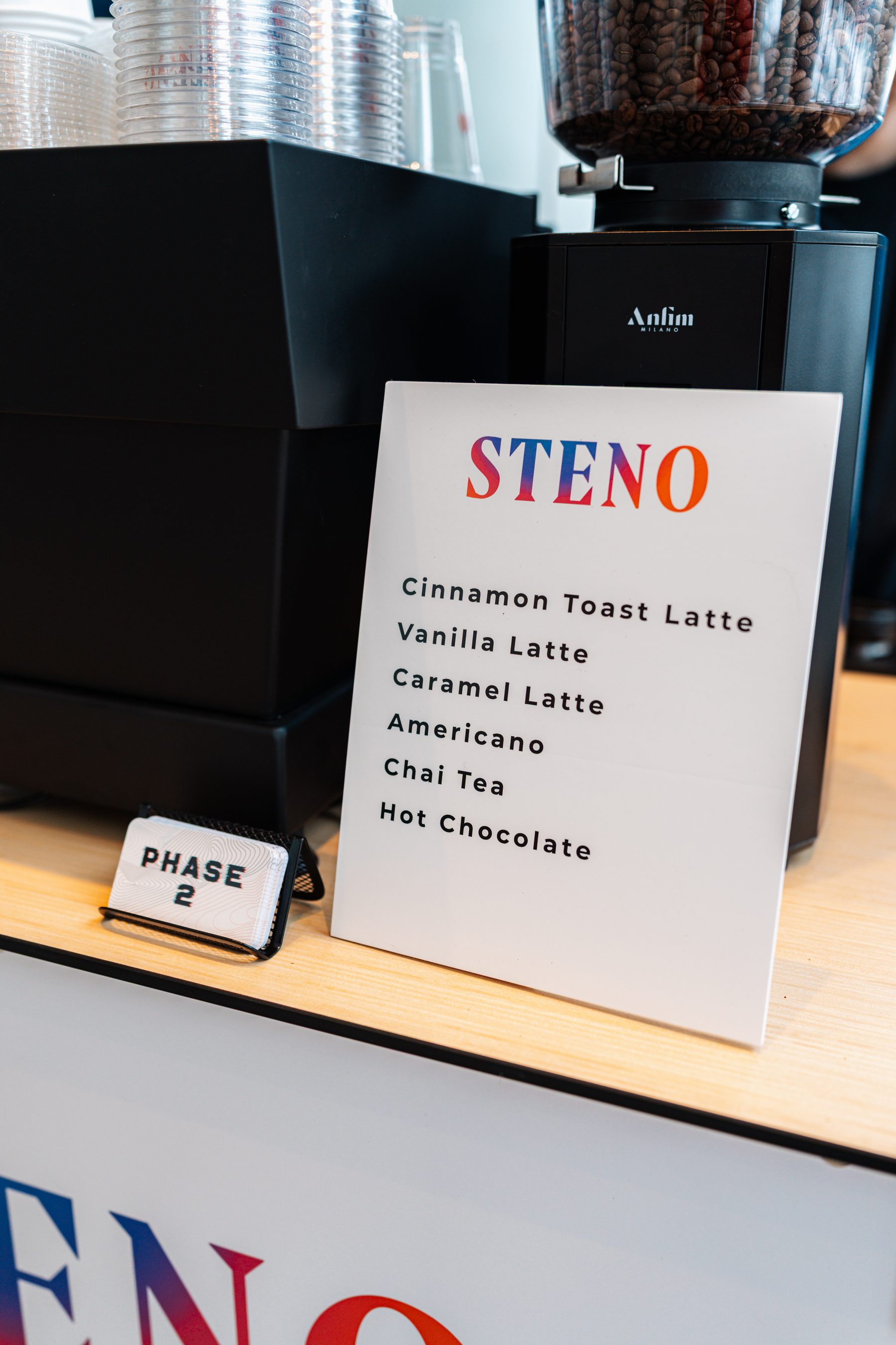 Custom branded coffee menu at Phase 2 Steno brand activation Kansas City